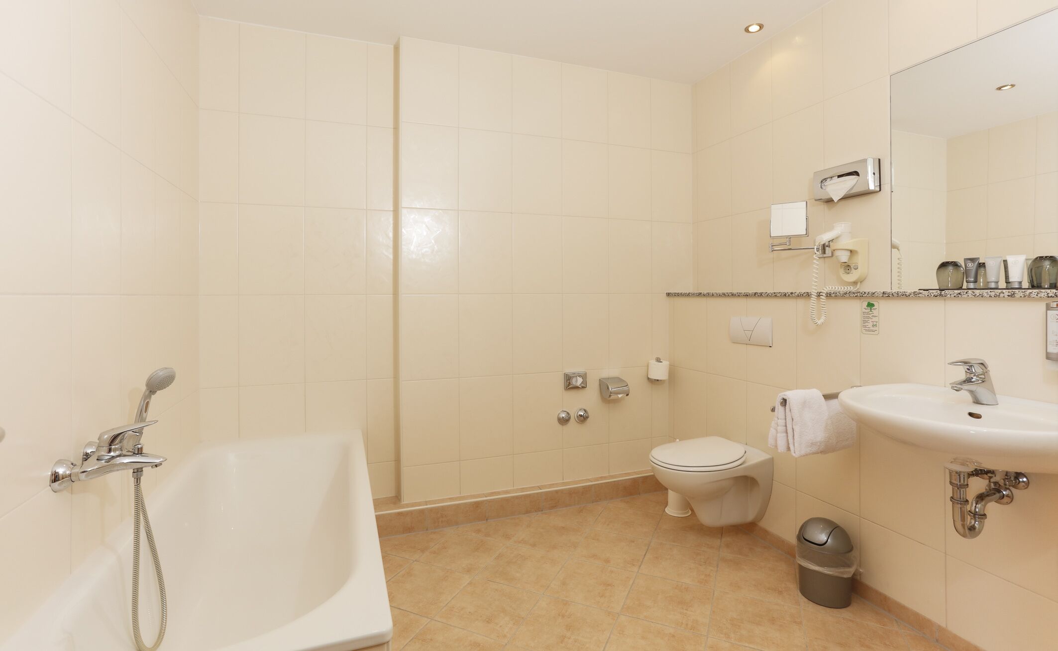 junior suite, 1 bedroom, non smoking, river view | bathroom | shower, free toiletries, hair dryer, towels