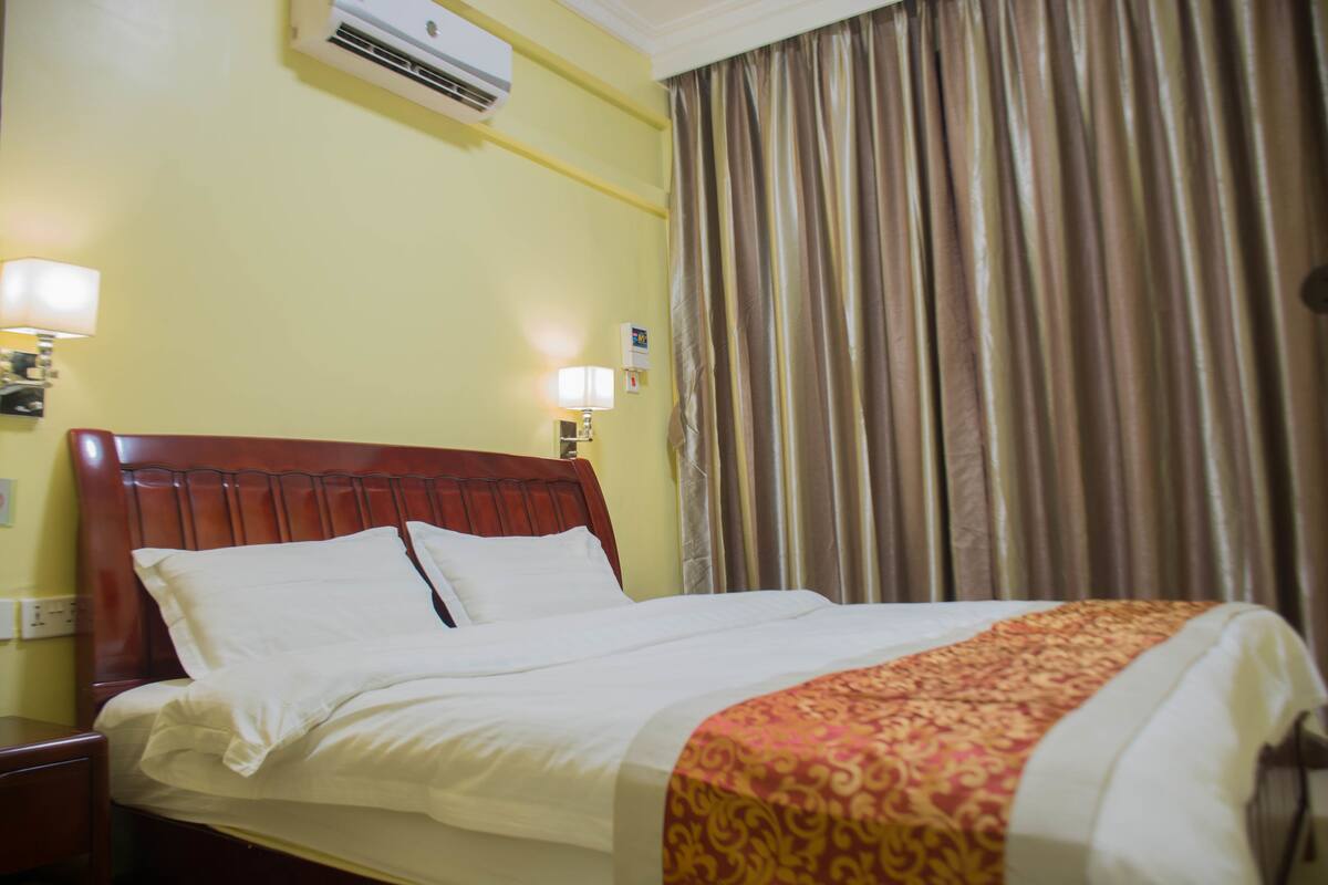 Economy Double Room, Non Smoking (Private bathroom Outside the room) | In-room safe, desk, iron/ironing board (on request), WiFi (free)