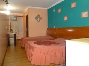 Minibar, desk, blackout drapes, iron/ironing board