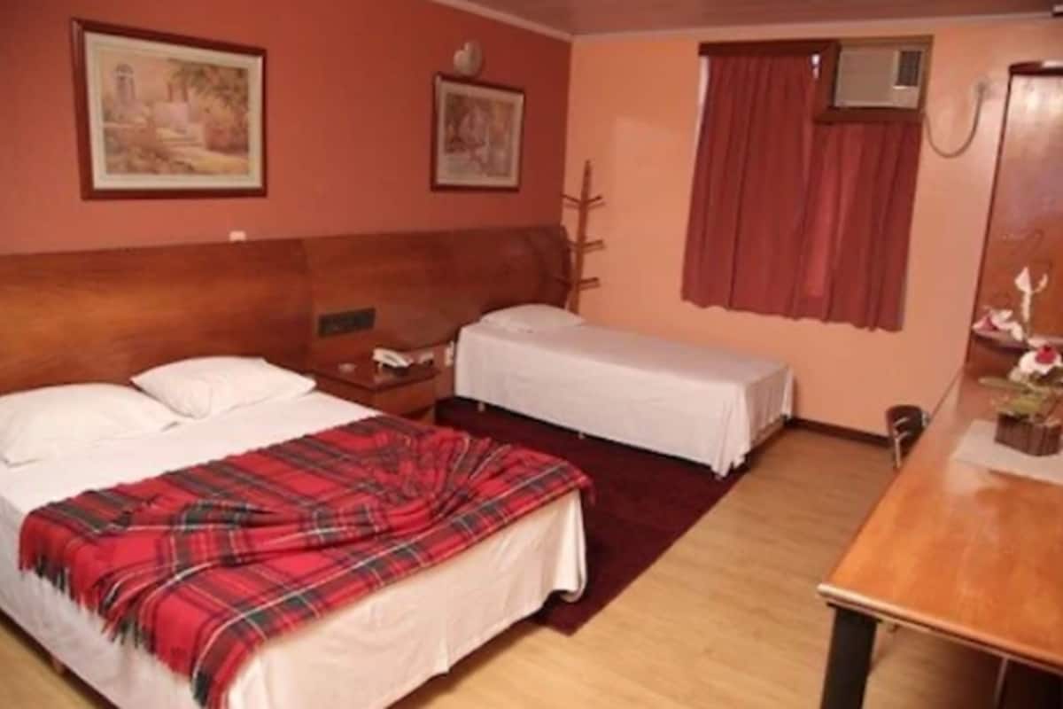 Triple Room | Minibar, desk, blackout drapes, iron/ironing board (on request)