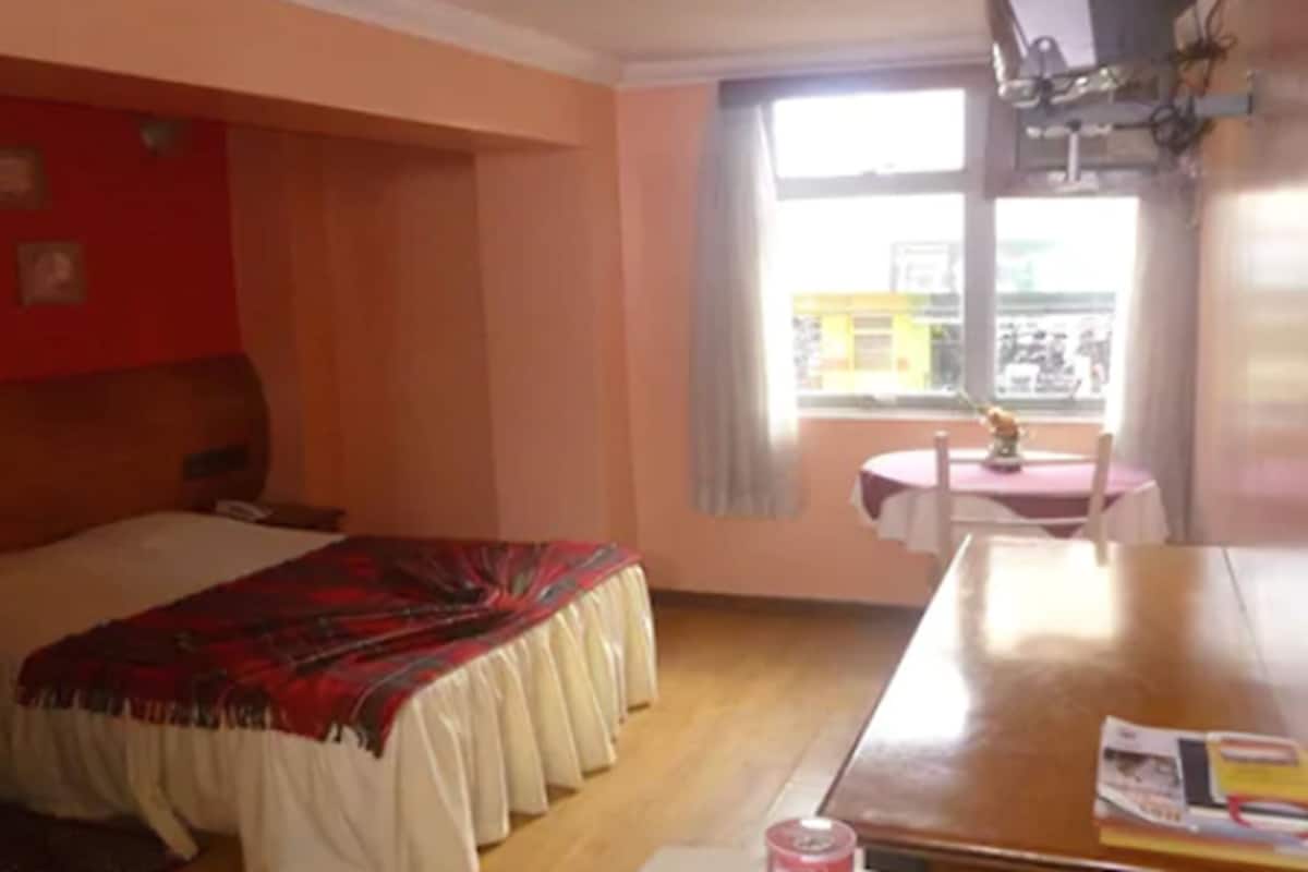 Double Room | Minibar, desk, blackout drapes, iron/ironing board (on request)