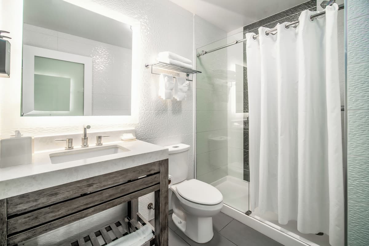 Premium bedding, blackout curtains, iron/ironing board, free WiFi