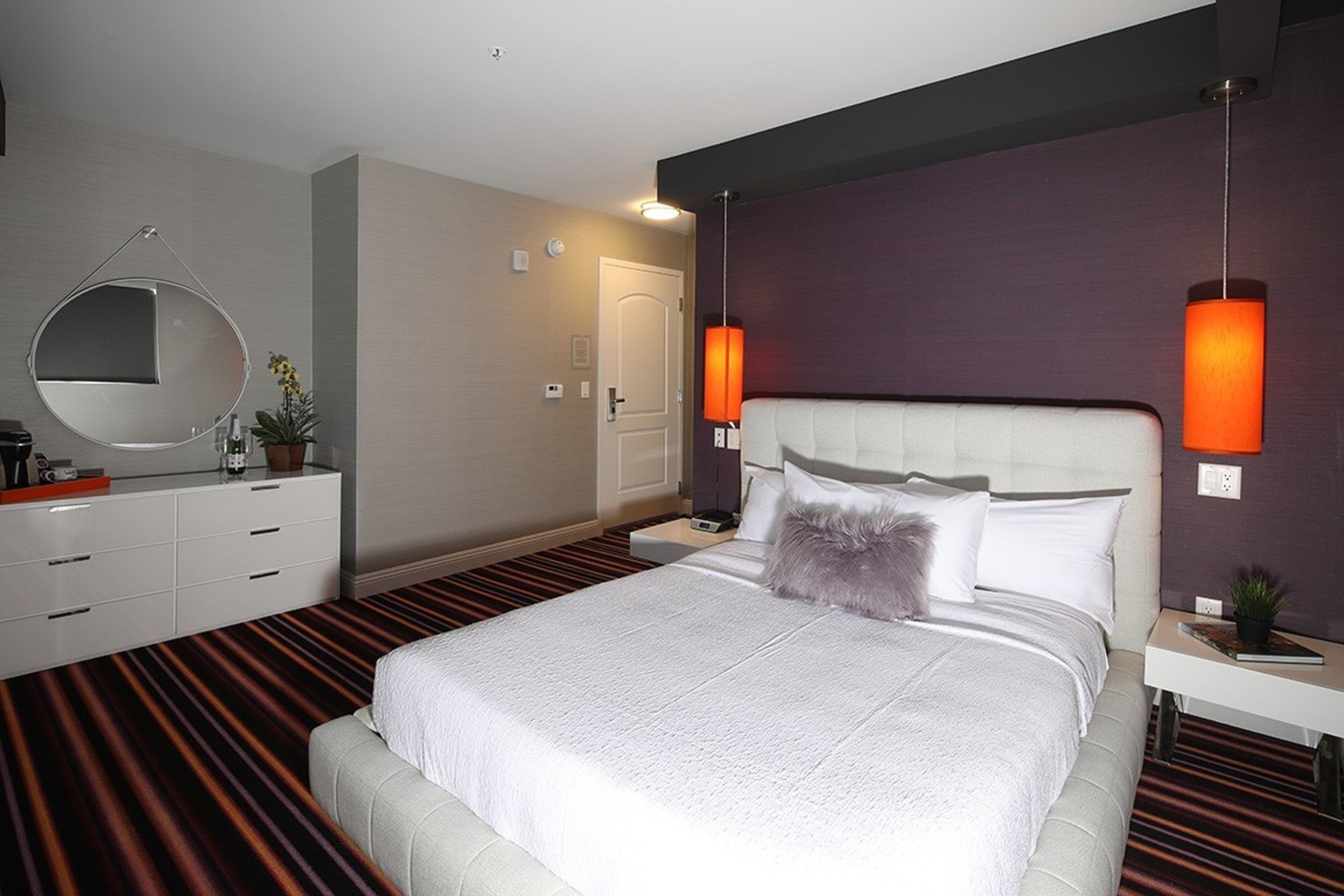 deluxe room, 1 queen bed | premium bedding, blackout curtains, iron/ironing board, free wifi