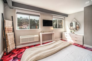 Premium bedding, blackout curtains, iron/ironing board, free WiFi