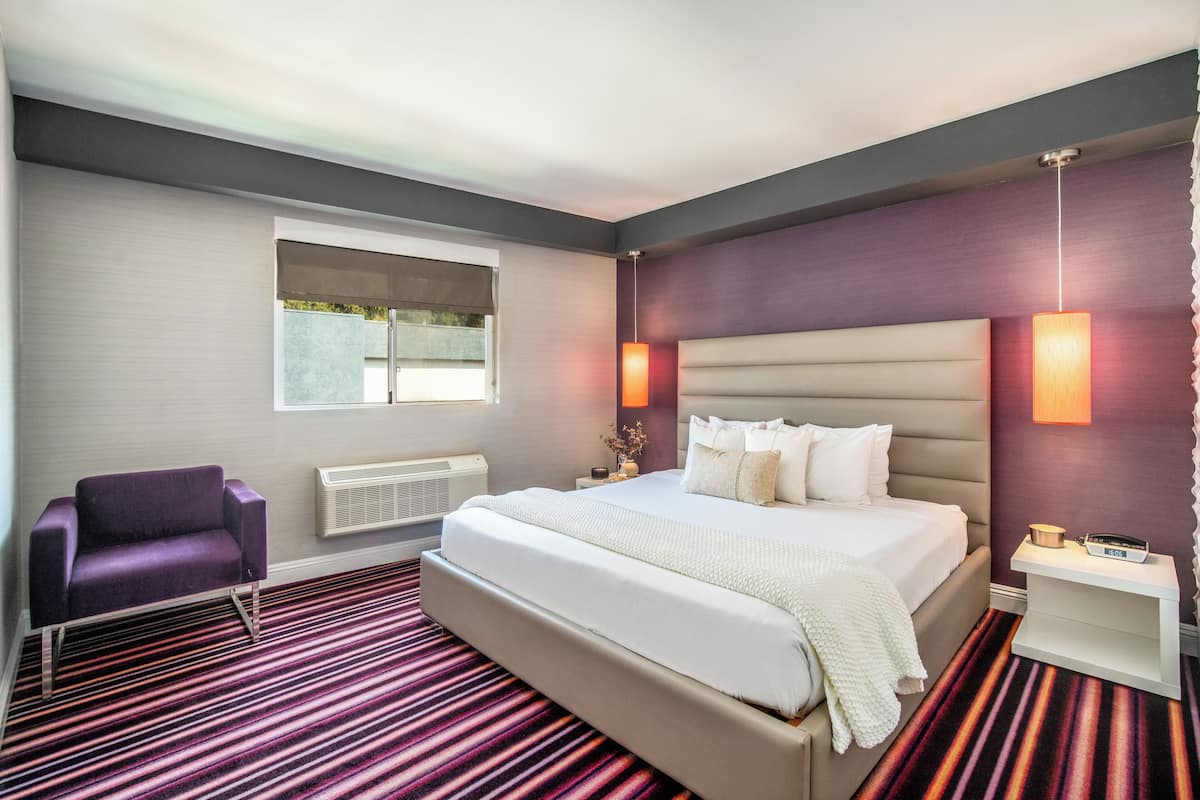 Suite, 1 kingsize bed | Luxe beddengoed, verduisterende gordijnen, een strijkplank/strijkijzer