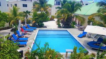 Outdoor pool, pool umbrellas, sun loungers