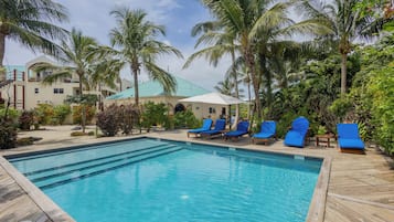Outdoor pool, pool umbrellas, sun loungers