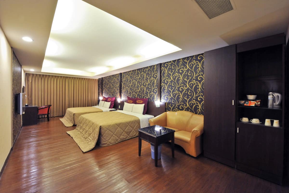 Standard Quadruple Room | Free minibar, desk, blackout drapes, rollaway beds