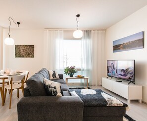 Nordica Design Apartment | Living room | Flat-screen TV - Nordica Design Residence Rovaniemi (Rovaniemi)