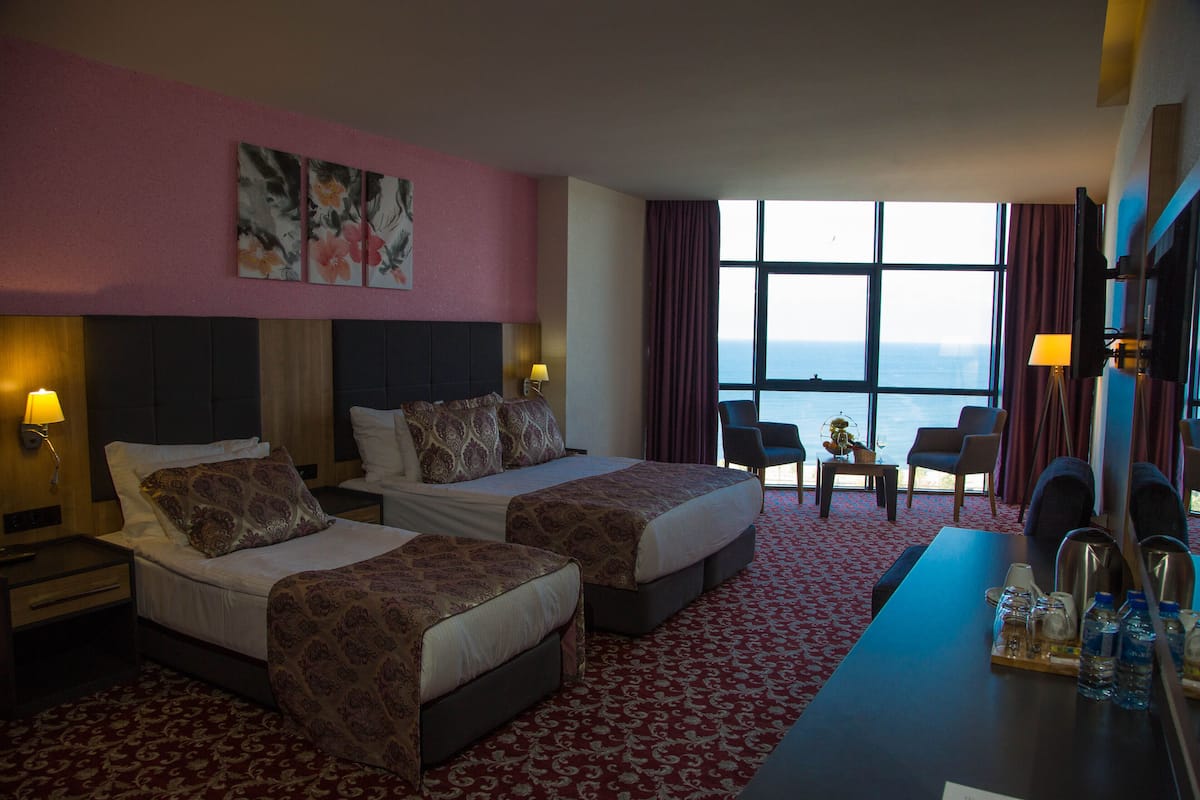 Superior Triple Room | 1 bedroom, minibar, in-room safe, blackout drapes