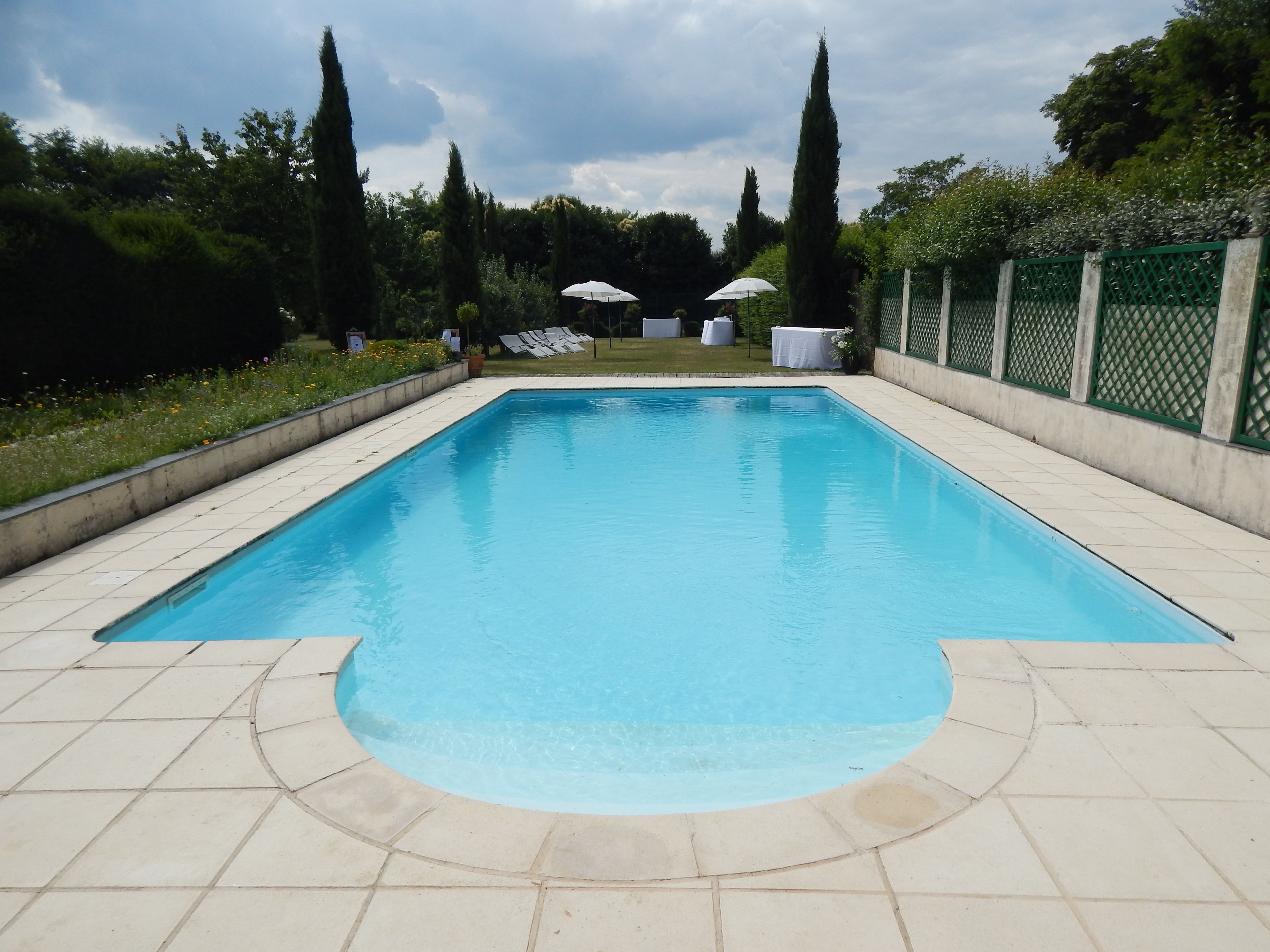 seasonal outdoor pool, pool umbrellas
