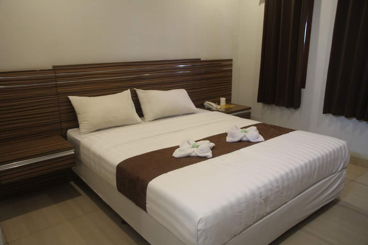 Superior kamer | Een bureau, extra bedden, gratis wifi, beddengoed