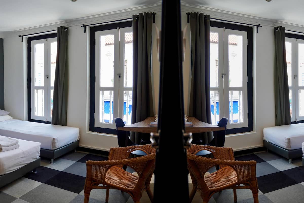 Family Room | Minibar, in-room safe, iron/ironing board, free WiFi