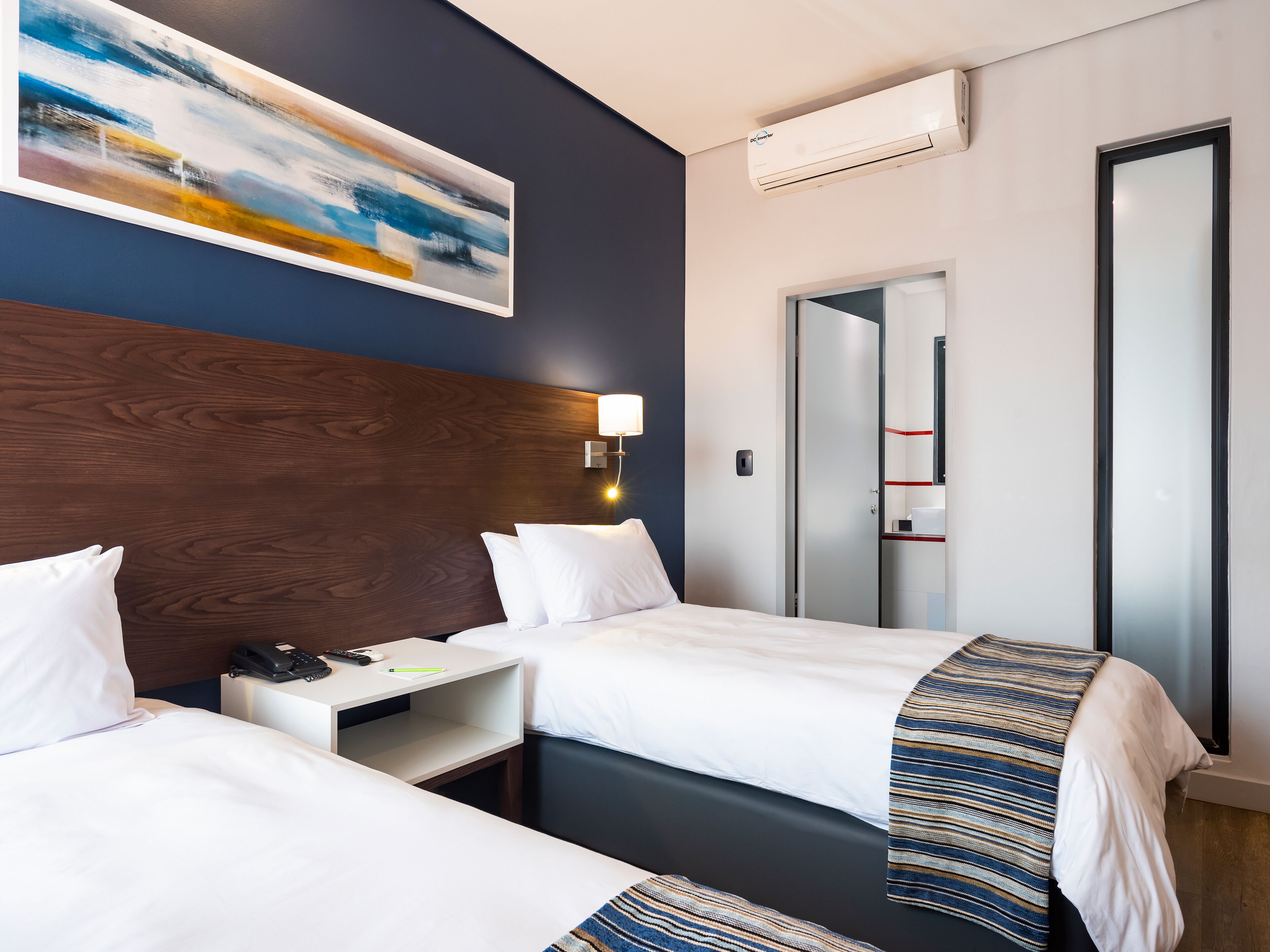 standard twin room | in-room safe, desk, blackout curtains, soundproofing