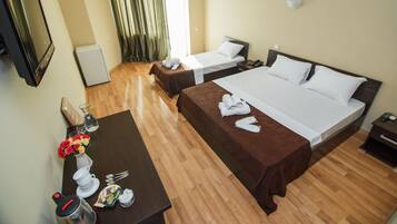 Triple Room | Minibar, desk, soundproofing, iron/ironing board