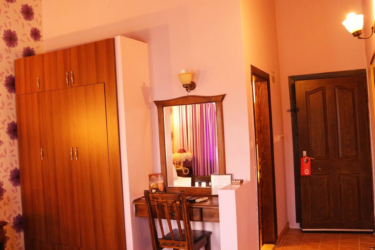 Habitación doble Deluxe | Ropa de cama de alta calidad y minibar