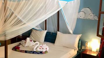 Family Room, 2 Bedrooms, Ocean View | 1 bedroom, in-room safe, individually decorated, individually furnished