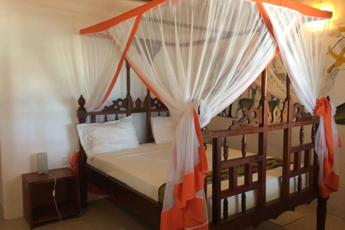 Economy Double Room, 1 Queen Bed, Partial Sea View | 1 bedroom, in-room safe, desk, WiFi (free)