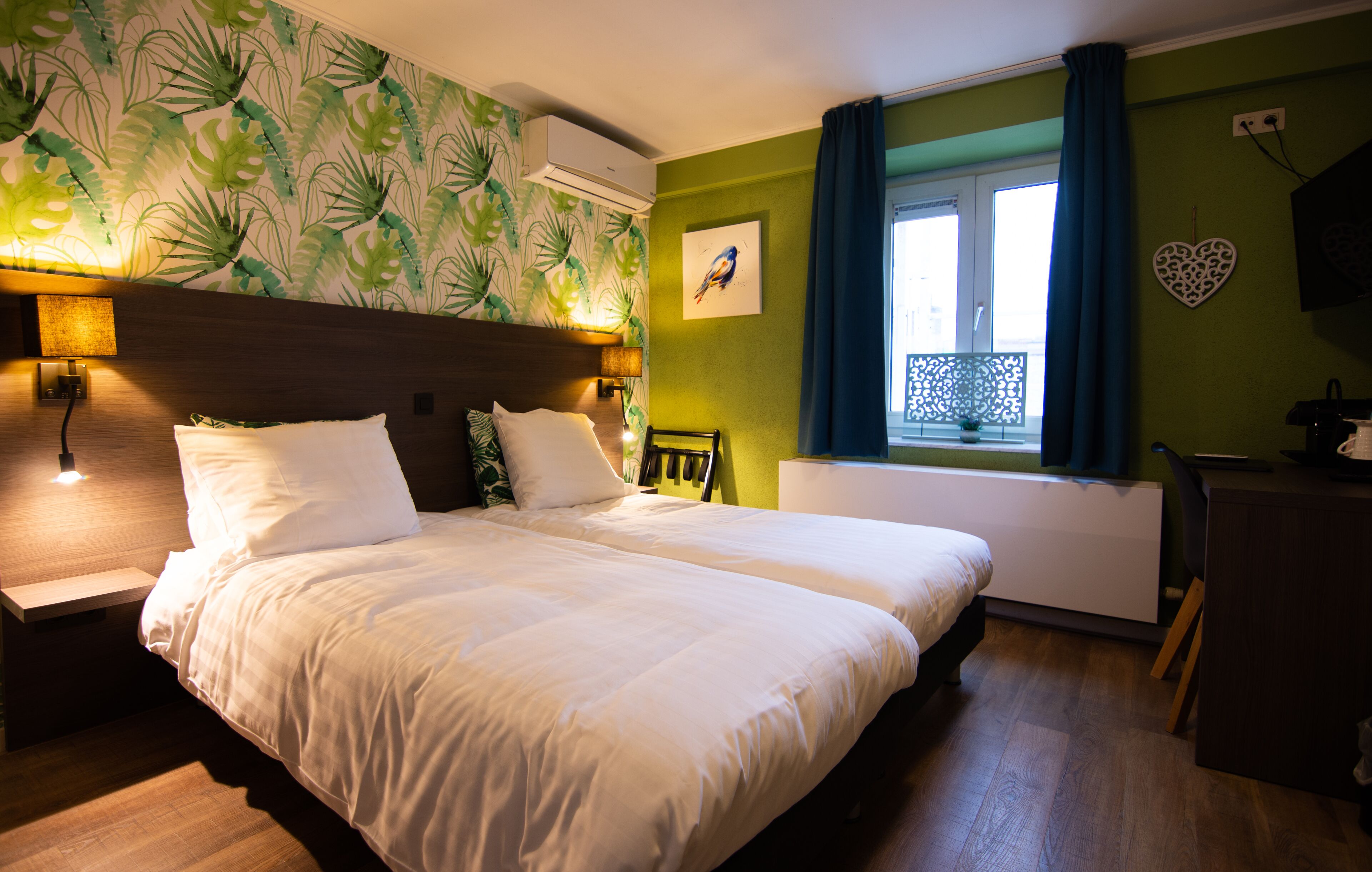 standard twin room | desk, laptop workspace, blackout curtains, iron/ironing board