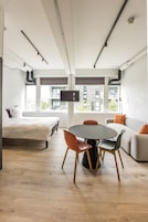 Apartment, Kitchenette | Living area | Flat-screen TV, heated floors