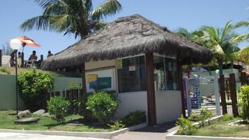 Standalone club surrounded by lush greenery, offering a tranquil retreat.