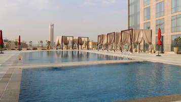 2 outdoor pools, open 6:00 AM to 11:00 PM, pool loungers