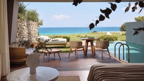 A room with a view of the sea, a pool, and outdoor seating. - Lesante Blu - The Leading Hotels of the World, Adults Only (Zakynthos)