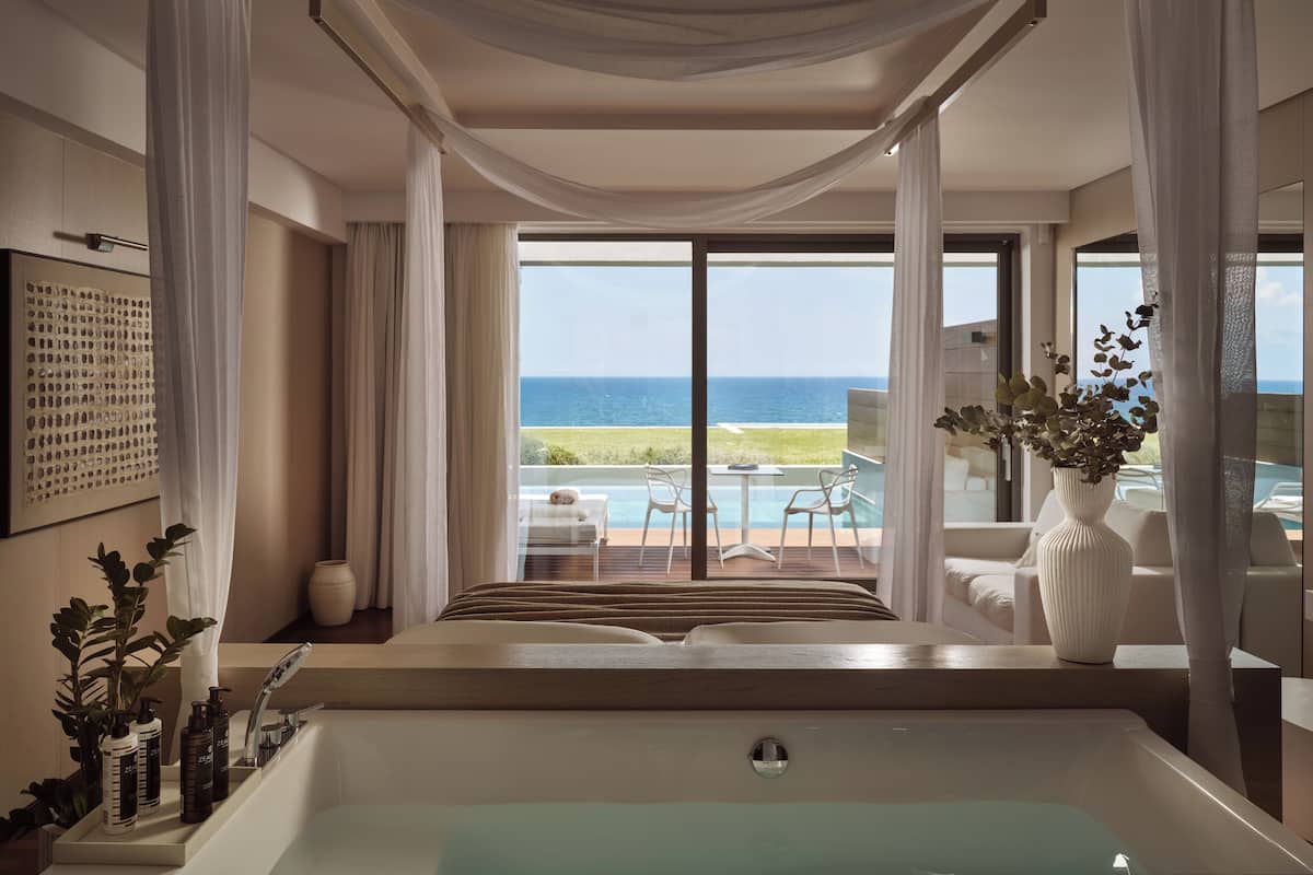 Separate bathtub and shower, designer toiletries, hair dryer, bathrobes