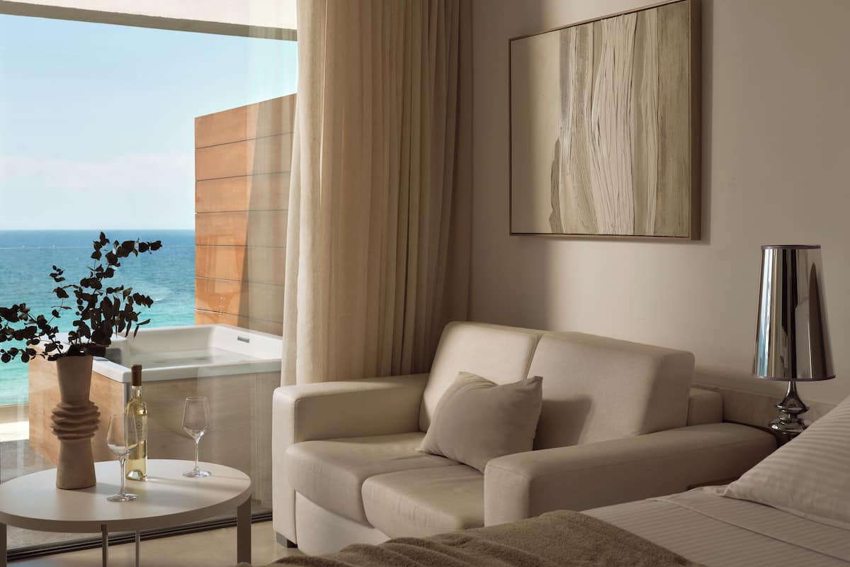 Suite, Jetted Tub, Sea View | Minibar, in-room safe, desk, laptop workspace