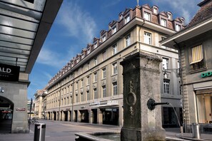 A historic hotel with a classic facade, multiple stories, and a prominent entrance.