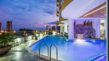 Outdoor pool, open 10:00 AM to 7:00 PM, pool umbrellas, sun loungers