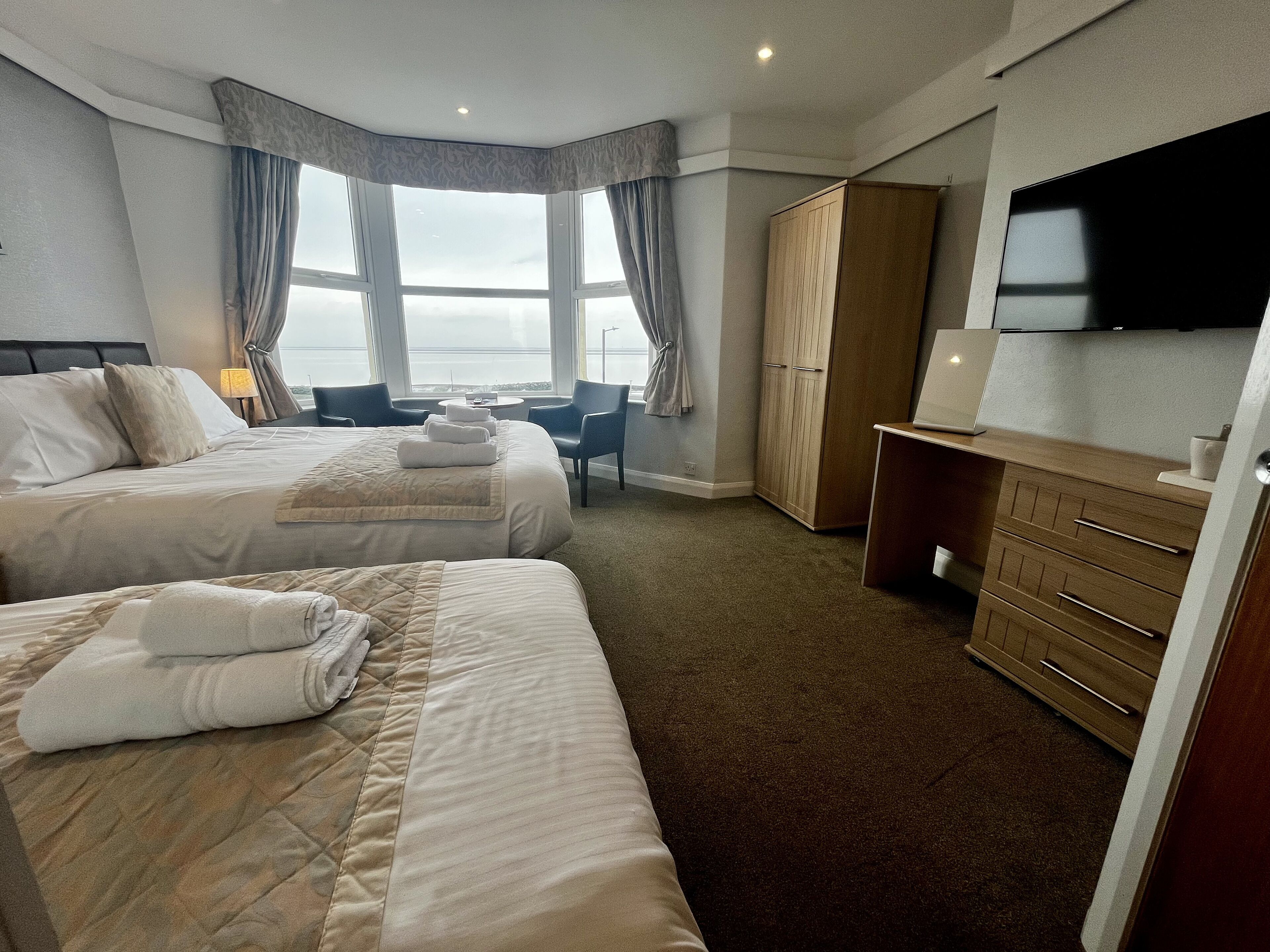 family triple room, sea view | desk, iron/ironing board, free wifi, bed sheets