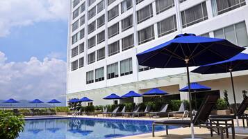 Outdoor pool, pool umbrellas, pool loungers