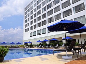 Outdoor pool, pool umbrellas, pool loungers