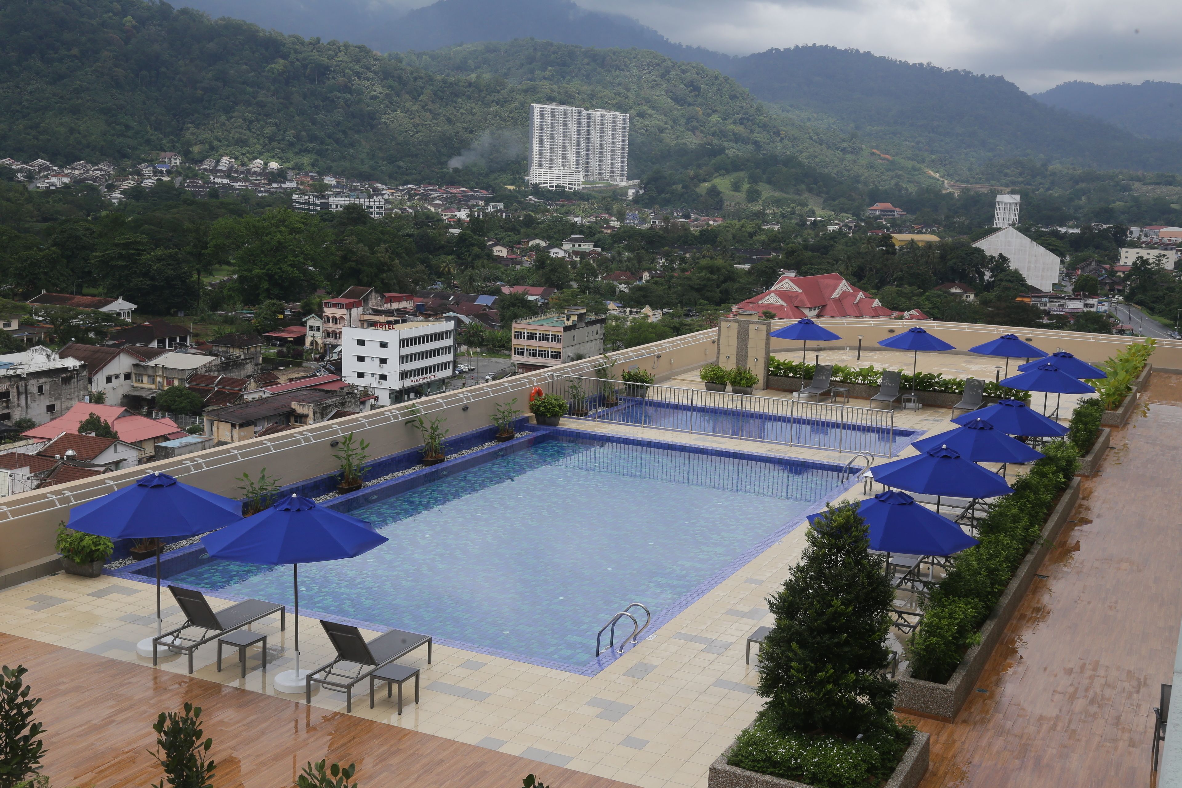 outdoor pool, pool umbrellas, pool loungers