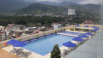 Outdoor pool, pool umbrellas, pool loungers
