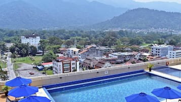 Outdoor pool, pool umbrellas, pool loungers