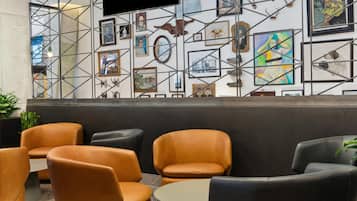 3 bars/lounges, rooftop bar, cocktail bar