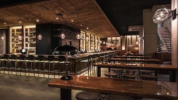 3 bars/lounges, rooftop bar, cocktail bar