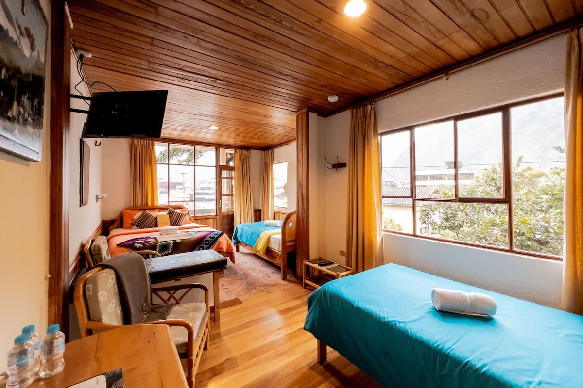 Habitación triple estándar, 1 habitación, vista al jardín | Wifi gratis y ropa de cama
