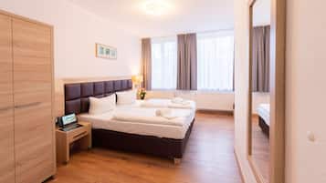 Familiekamer | Een bureau, verduisterende gordijnen, geluiddichte muren, gratis wifi