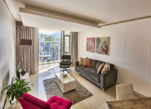 Superior Apartment, 2 Bedrooms | Living area | 1-cm flat-screen TV with satellite channels, TV - The Quadrant Apartments (Cape Town)