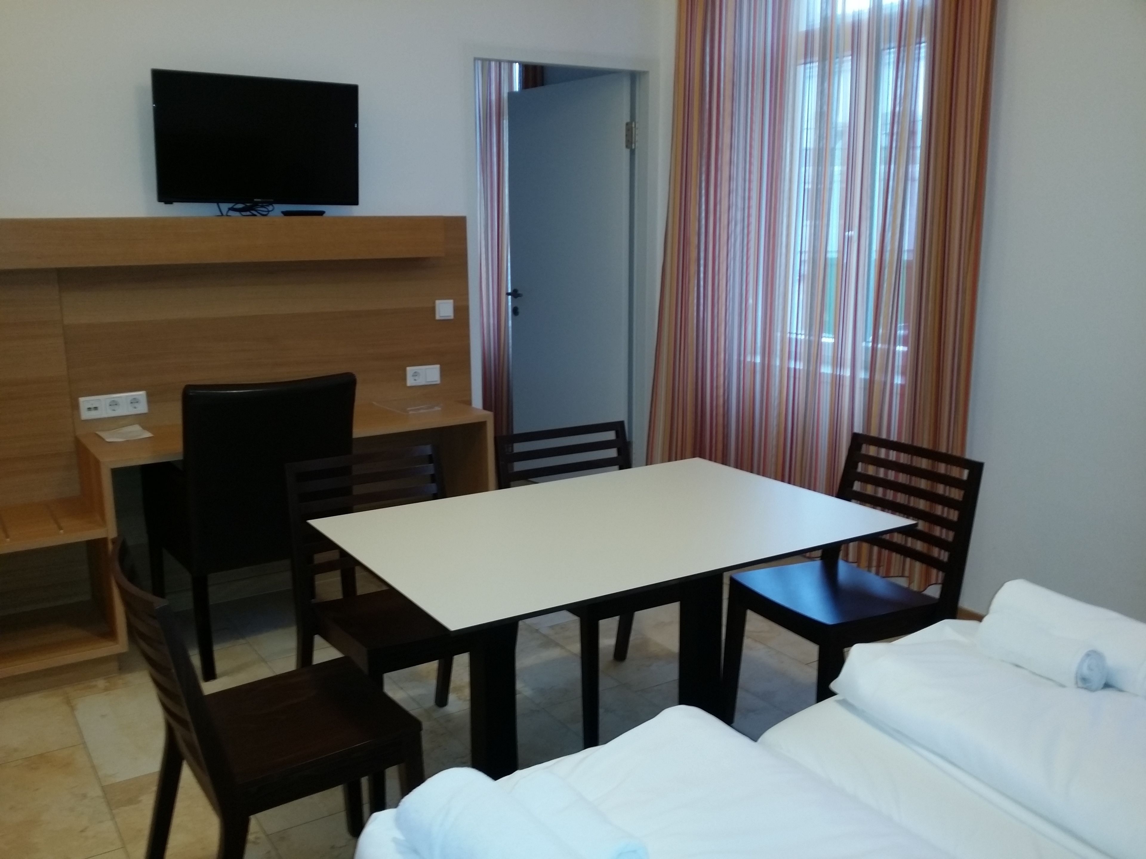 quadruple room | in-room dining