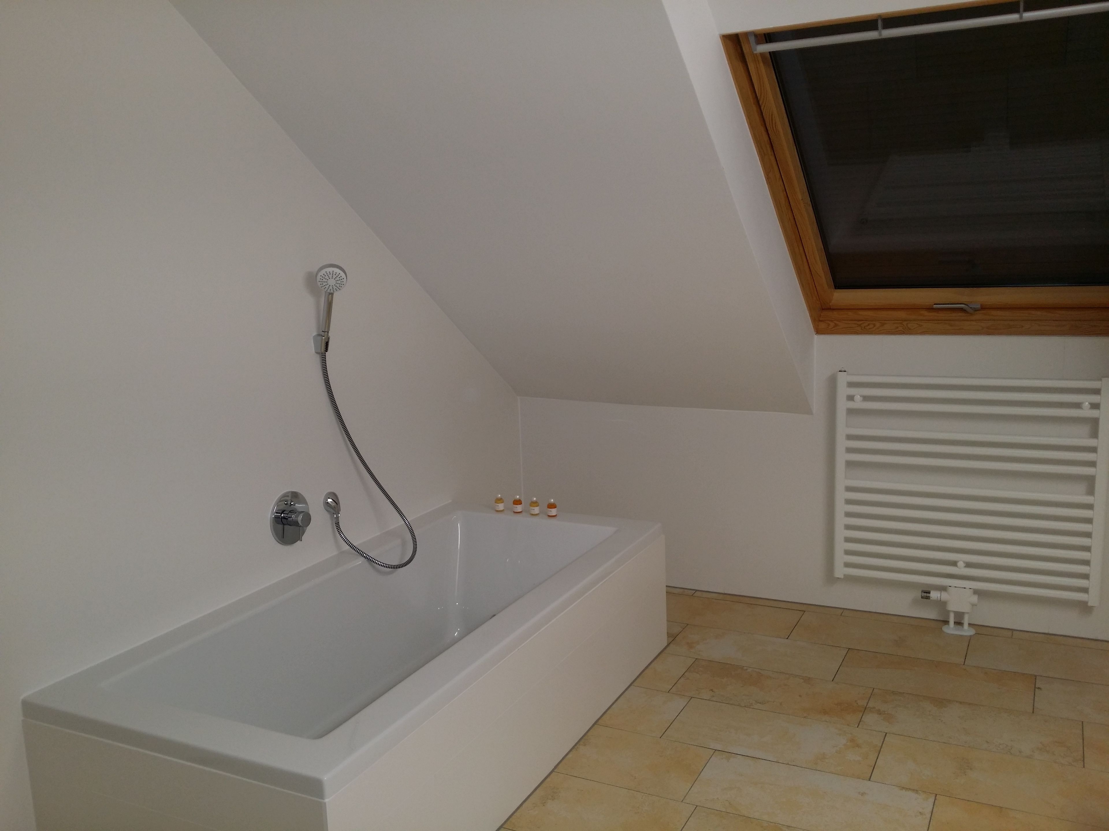 suite, balcony, garden view | deep-soaking bathtub