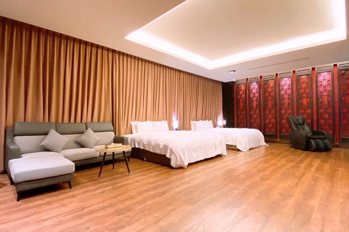 deluxe quadruple room | blackout curtains, soundproofing, free wifi, bed sheets