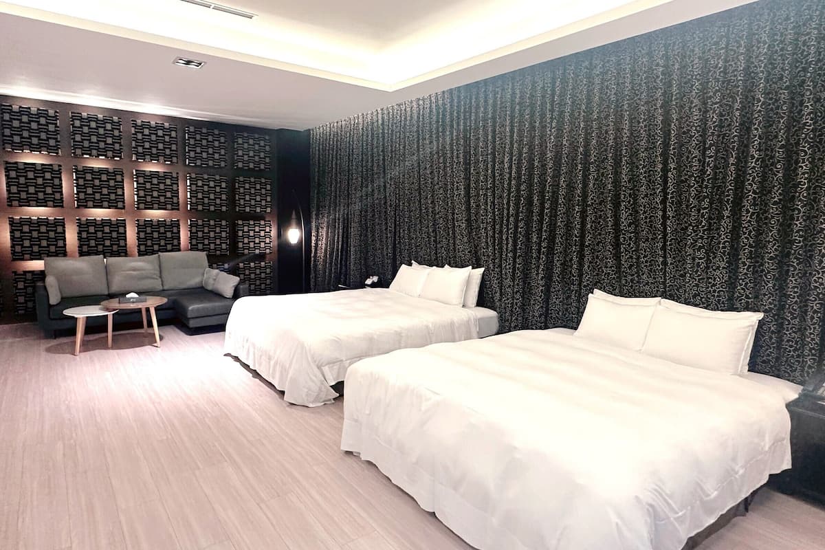 deluxe quadruple room | blackout curtains, soundproofing, free wifi, bed sheets