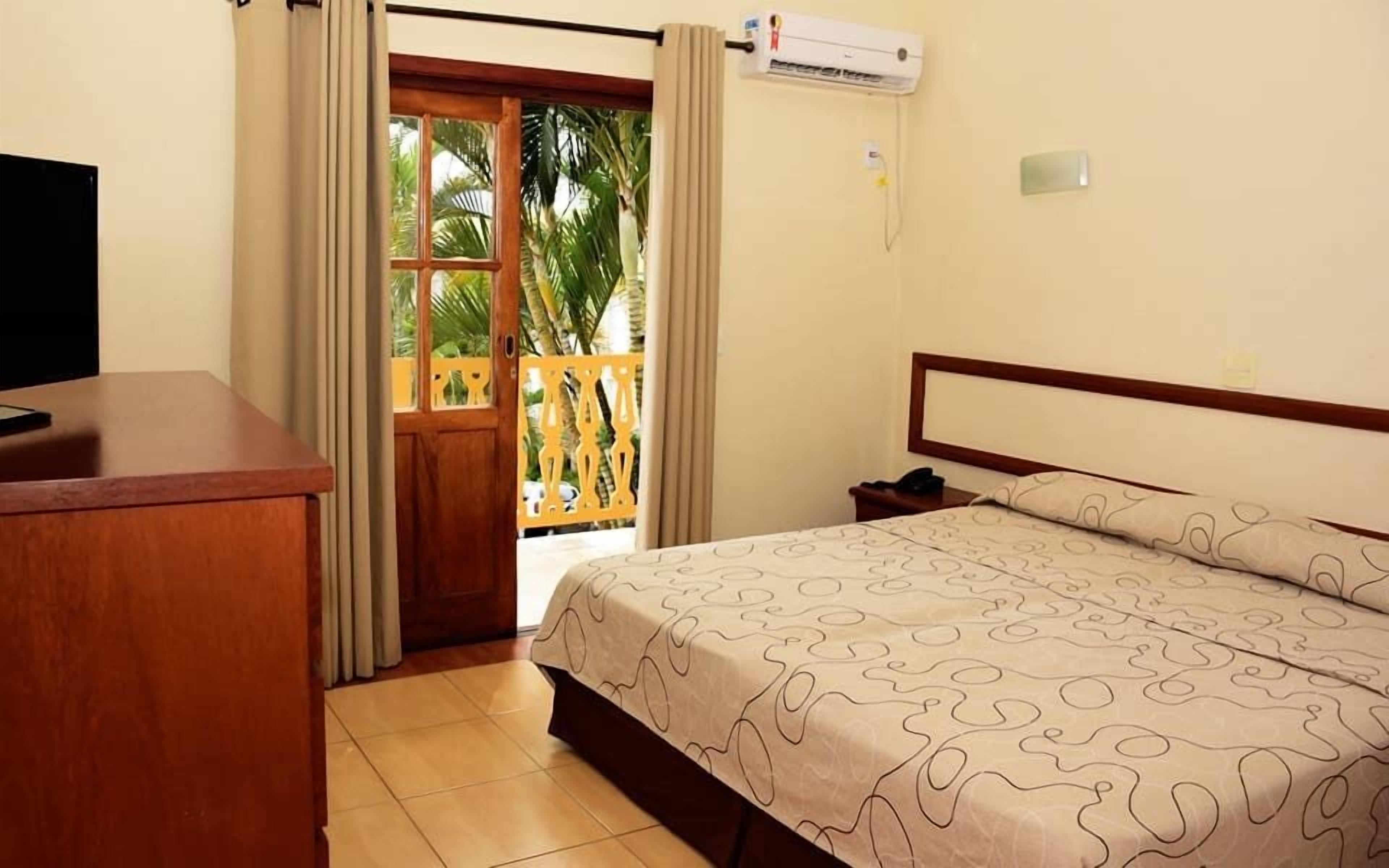 Chalé superior | Frigobar, cofres nos quartos, escrivaninha, cortinas blackout