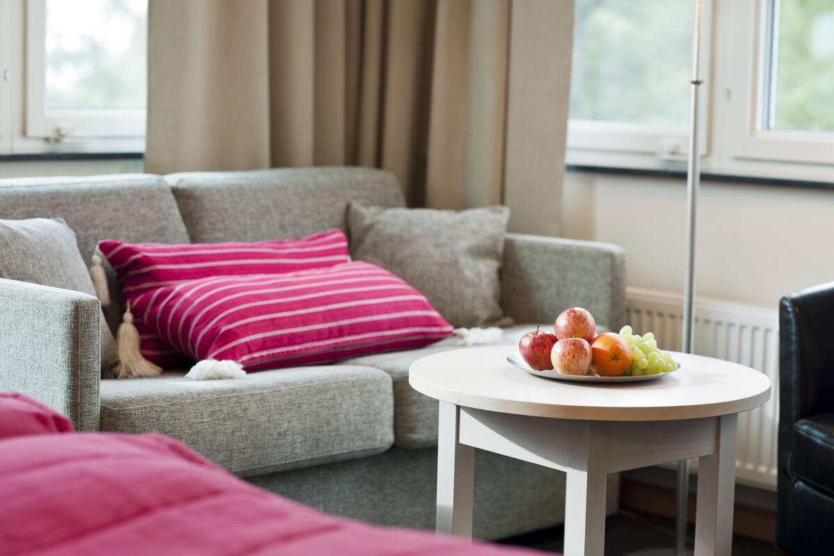 superior double room, lake view | living area | flat-screen tv