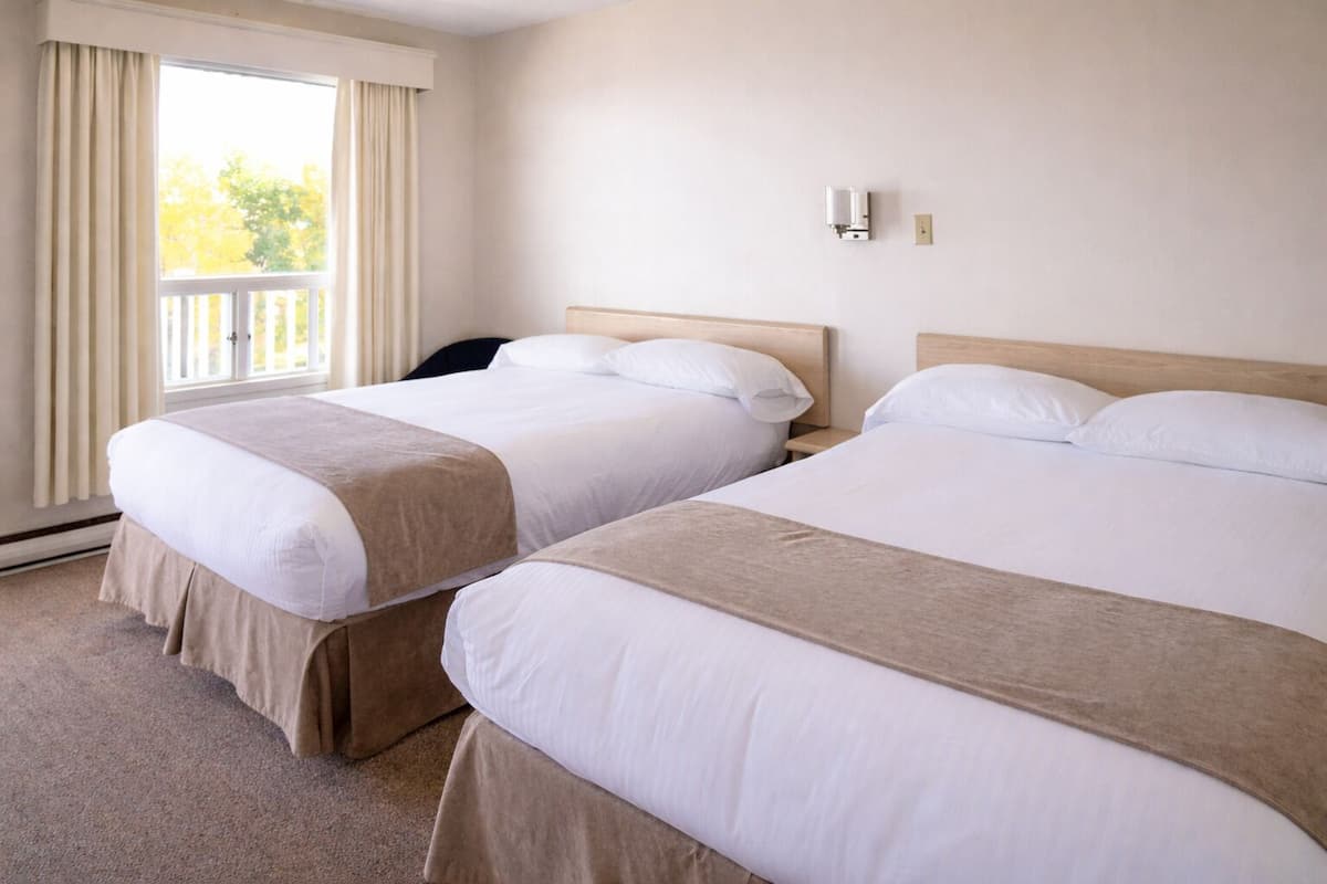 Economy Room, 2 Double Beds | Premium bedding, iron/ironing board, cribs/infant beds, rollaway beds