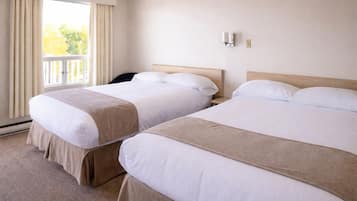 Economy Room, 2 Double Beds | Premium bedding, iron/ironing board, cribs/infant beds, rollaway beds